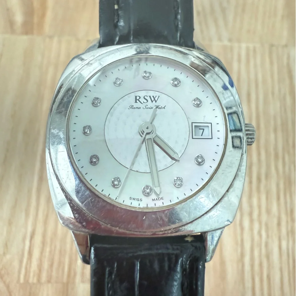 RSW ladies Roma Swiss silver tone black leather watch NEW BATTERY